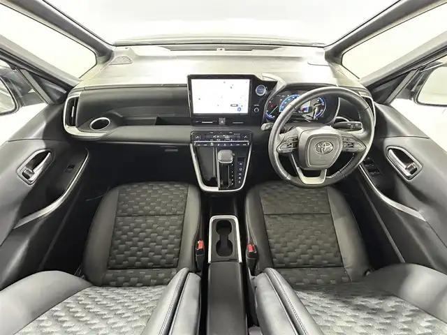 トヨタ ヴォクシー ハイブリッド S－Z 佐賀県 2022(令4)年 2.1万km アティチュードブラックマイカ 快適利便パッケージ/プロジェクター式LEDヘッドライト/純正10.5インチディスプレイオーディオ/ナビキット/フルセグ/CD/DVDデッキ/ビルトインETC2.0/ドライブレコーダー/両側パワースライドドア/パワーバックドア/シートヒーター/オットマン/トヨタセーフティセンス/プリクラッシュセーフティ/レーントレーシングアシスト/レーダークルーズコントロール/アダプティブハイビームシステム/クリアランスソナー