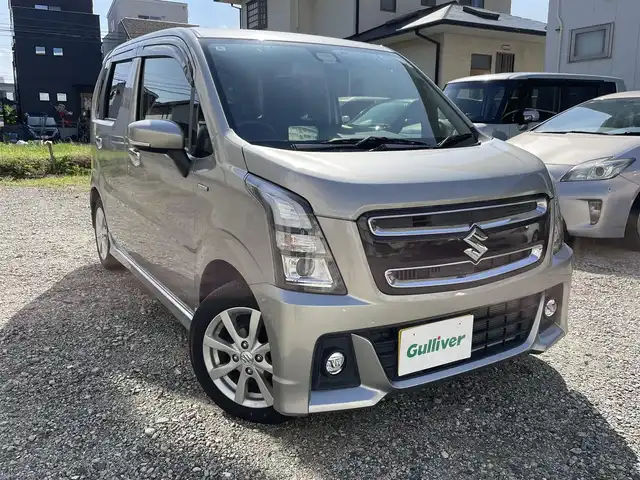 スズキ ワゴンＲ スティングレー HYBRID X 福岡県 2018(平30)年 1.8万km スチールシルバーM 社外ナビ/（AM/FM/CD/DVD/iPod/AUX/ミュージックサーバー/ワンセグTV）/アイドリングストップ/衝突軽減ブレーキ/横滑り防止/レーンキープ/ハンズフリー/シートヒーター（運転席）/ドライブレコーダー前（SD無し）/純正フロアマット/純正アルミホイール/オートライト/フォグランプ/電格ミラー/保証書/取扱説明書/スペアキー×１/プッシュスタート