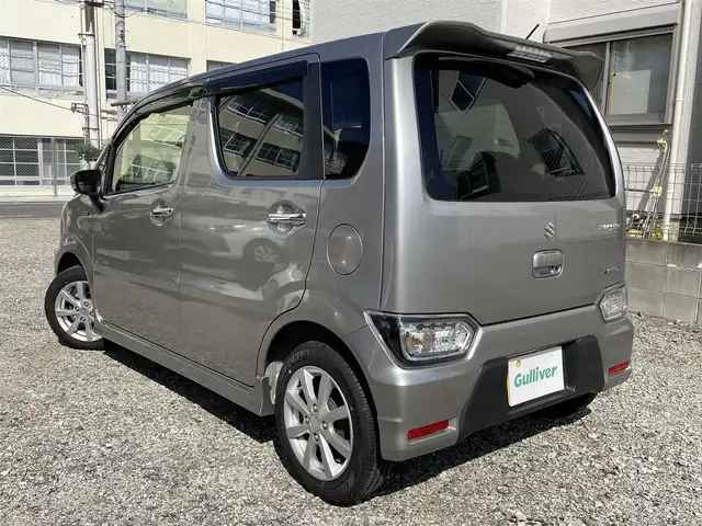 スズキ ワゴンＲ スティングレー HYBRID X 福岡県 2018(平30)年 1.8万km スチールシルバーM 社外ナビ/（AM/FM/CD/DVD/iPod/AUX/ミュージックサーバー/ワンセグTV）/アイドリングストップ/衝突軽減ブレーキ/横滑り防止/レーンキープ/ハンズフリー/シートヒーター（運転席）/ドライブレコーダー前（SD無し）/純正フロアマット/純正アルミホイール/オートライト/フォグランプ/電格ミラー/保証書/取扱説明書/スペアキー×１/プッシュスタート
