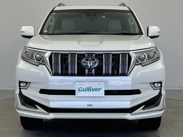 トヨタ ランドクルーザー プラド TX Lパッケージ 新潟県 2023(令5)年 3.3万km ホワイトパールクリスタルシャイン モデリスタエアロ/サンルーフ/ベージュ革シート/メーカーOPナビ/全方位カメラ（フロント/サイド/リア）/プリクラッシュセーフティ/レーダークルーズコントロール/レーンキープアシスト/パーキングサポートブレーキ/ビルトインETC2.0/前後ドライブレコーダー/エアシート/シートヒーター/オートライト/オートハイビーム/LEDヘッドライト/プッシュスタート/ウッドコンビステアリング/ステアリングスイッチ/オートドアミラー/ウィンカーミラー/フロアマット/ドアバイザー