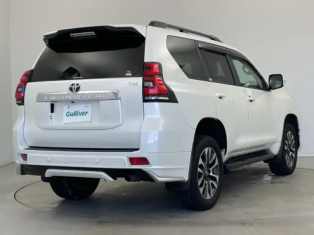 トヨタ ランドクルーザー プラド TX Lパッケージ 新潟県 2023(令5)年 3.3万km ホワイトパールクリスタルシャイン モデリスタエアロ/サンルーフ/ベージュ革シート/メーカーOPナビ/全方位カメラ（フロント/サイド/リア）/プリクラッシュセーフティ/レーダークルーズコントロール/レーンキープアシスト/パーキングサポートブレーキ/ビルトインETC2.0/前後ドライブレコーダー/エアシート/シートヒーター/オートライト/オートハイビーム/LEDヘッドライト/プッシュスタート/ウッドコンビステアリング/ステアリングスイッチ/オートドアミラー/ウィンカーミラー/フロアマット/ドアバイザー