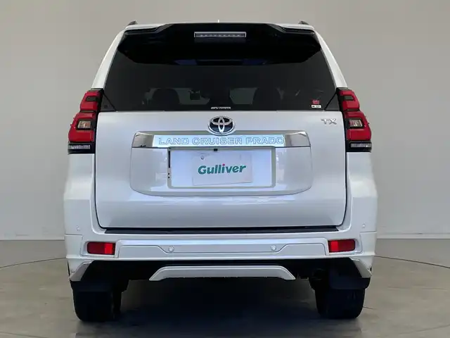 トヨタ ランドクルーザー プラド TX Lパッケージ 新潟県 2023(令5)年 3.3万km ホワイトパールクリスタルシャイン モデリスタエアロ/サンルーフ/ベージュ革シート/メーカーOPナビ/全方位カメラ（フロント/サイド/リア）/プリクラッシュセーフティ/レーダークルーズコントロール/レーンキープアシスト/パーキングサポートブレーキ/ビルトインETC2.0/前後ドライブレコーダー/エアシート/シートヒーター/オートライト/オートハイビーム/LEDヘッドライト/プッシュスタート/ウッドコンビステアリング/ステアリングスイッチ/オートドアミラー/ウィンカーミラー/フロアマット/ドアバイザー