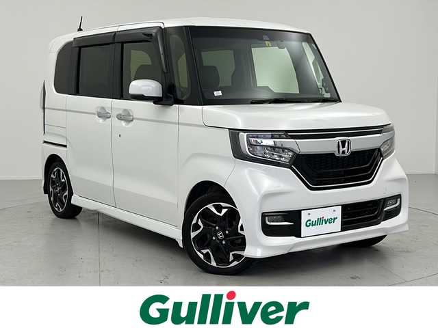 ホンダ Ｎ ＢＯＸ カスタム G L ターボ ホンダセンシング 愛知県 2018(平30)年 7.4万km プラチナホワイトパール ホンダセンシング/・衝突軽減ブレーキ（CMBS）/・車線維持支援システム（LKAS）/・アダプティブクルーズコントロール（ACC）/・後方誤発進抑制機能/・誤発進抑制機能/両側パワースライドドア/純正SDナビ/地デジTV/【DVD/CD再生機能　Bluetooth接続】/バックカメラ/ドライブレコーダー（前後撮影）/革巻きステアリング/ステアリングスイッチ/パドルシフト/ETC/LEDヘッドライト/フォグライト/ウインカーミラー/リアコーナーセンサー/純正15インチアルミホイル/サイド/カーテンエアバッグ/スマートキー