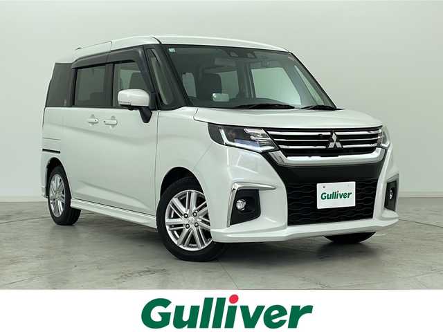 三菱 デリカＤ：２ ハイブリッドMZ 全方位カメラパッケージ 宮城県 2023(令5)年 2.5万km ピュアホワイトP スズキセーフティサポート	/・後退時ブレーキサポート	/・車線逸脱抑制制御機能	/・車線逸脱警報機能	/・パーキングソナー	/・横滑り防止装置	/・ハイビームアシスト	/アダプティブクルーズコントロール/両側パワースライドドア/ケンウッドメモリナビ（MDV-D709BT）/・BT.CD/DVD.AM/FM.HDMI/全方位カメラ/カラーヘッドアップディスプレイ/ETC/純正15inAW/シートヒーター（D/N）/LEDヘッドライト/ドライブレコーダー（前方）/ステアリングスイッチ/純正フロアマット/アイドリングストップ/プッシュスタート/スマートキー