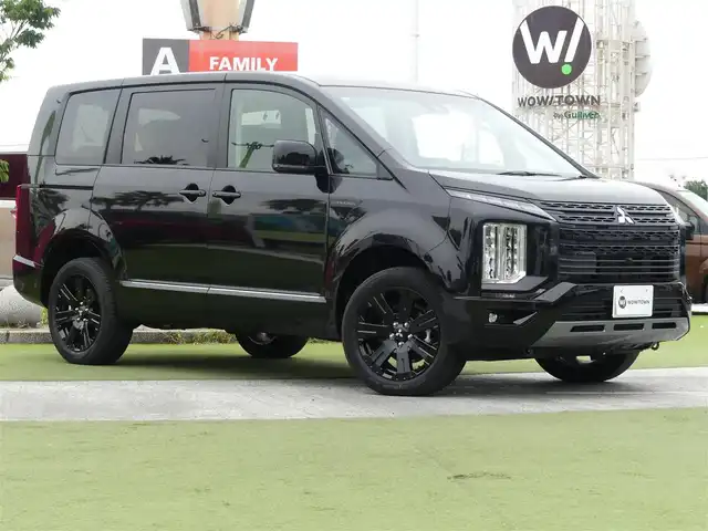 三菱 デリカＤ：５ シャモニー 千葉県 2025(令7)年 0.1万km未満 黒Ⅱ 【CHAMONIX (7人)　4WD　e-Assist/オリジナルナビ取付パッケージ＋リアモニター取付パッケージ(25/300)　ステップレス　（7人）D:5専用11型ナビゲーション(322/300)/e-Assist/・衝突被害軽減ブレーキシステム（FCM）/・車線逸脱警報システム（LDW）/・レーダークルーズコントロールシステム（ACC）/・誤発進抑制機能（前進＆後退時）（UMS）/・オートマチックハイビーム[AHB]/両側パワースライドドア/エレクトリックテールゲート/純正メモリーナビ/地デジTV/【DVD/CD再生機能　Bluetooth接続】/マルチアラウンドモニター/運転席パワーシート/前席シートヒーター/ステアリングヒーター/ステアリングスイッチ/革巻きステアリング/パドルシフト/純正18インチアルミホイル/サイド/カーテンエアバッグ/キーレスオペレーションシステム