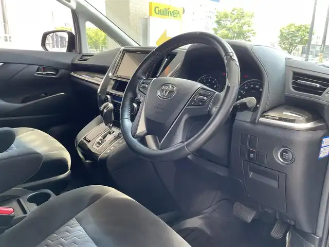 トヨタ ヴェルファイア Z 三重県 2015(平27)年 7.7万km ブラック 登録時76172km/禁煙車/カロッツェリア9インチナビ(AM/FM/CD/DVD/ワンセグ/Bluetooth)/カロッツェリア10.2インチフリップダウンモニター/ETC/LED/バックカメラ/前後クリアランスソナー/片側パワースライドドア/オートライト/オートホールドブレーキ/横滑り防止装置/電格ミラー/プッシュスタート/スマートキー×2