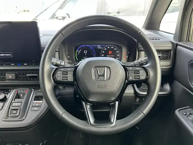 ホンダ ステップワゴン スパーダ eHEV 福岡県 2022(令4)年 4.7万km クリスタルブラックパール ホンダセンシング純正11.4型ナビ（CD/DVD/フルセグ/BT）純正15.6型フリップダウンモニター両側パワースライドドアアダブティプクルーズコントロールアラウンドビューモニターデジタルインナーミラーパワーバックドアハーフレザーシート前席シートヒーターLEDヘッドライトオートライト純正AWパドルシフトETC