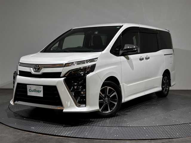 トヨタ ヴォクシー ZS 煌Ⅱ 愛媛県 2020(令2)年 5万km ホワイトパールクリスタルシャイン ・ワンオーナー/・純正ナビ(NSZN-Z68T)/(フルセグ/CD/DVD/BT)/・トヨタセーフティセンス/・純正フリップダウンモニター/・両側パワースライドドア/・バックカメラ/・前後ドライブレコーダー(DC-DR652)/・サイドサンシェード/・純正16インチアルミホイール/・純正フロアマット/・革製シートカバー/・ステアリングリモコン/・ドアバイザー/・ビルトインETC/・スペアキー/・取扱説明書/・保証書