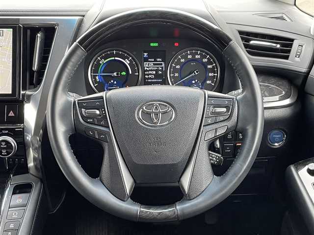 トヨタ アルファードハイブリット SR 道東・釧路十勝 2019(平31)年 6.4万km ブラック 4WD/MODELLISTAエアロ/Toyota Safety Sense/・PCS(プリクラッシュセーフティ)/・LTA(レーントレーシングアシスト)/・オートマチックハイビーム/・レーダークルーズコントロール/純正ディーラーOPメモリナビ/ (CD/DVD/BT/HDMI)/フルセグTV/バックカメラ/純正フリップダウンモニター/ビルトインETC/純正前後ドライブレコーダー/ウッドコンビステアリング/ステアリングスイッチ/レザーシート/パワーシート/ (運転席/助手席)/メモリーシート/ (運転席)/シートヒータ/ (運転席/助手席)/エアーシート/ (運転席/助手席)/オットマン/プッシュスタート/スマートキー/スペアキー/純正17インチAW/両側パワースライドドア/サイドステップ/純正二眼LEDヘッドライト/フォグランプ/ウインカーミラー/電動格納ミラー/横滑り防止装置/アイドリングストップ/保証書