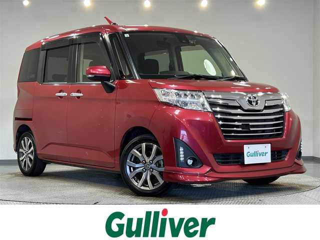 トヨタ ルーミー カスタムG－T 愛知県 2018(平30)年 3.7万km マゼンタベリーマイカM 純正SDナビ(NSCD-W66)/(Bluetooth/フルセグTV/CD/AM/FM/SD)/スマートアシスト　/　　-衝突回避支援ブレーキ/　　-車線逸脱警報/　　-ふらつき警報/　　-先行車発進お知らせ/　　-コーナーセンサー/　　-オートクルーズコントロール/　　-標識認識機能/両側パワースライドドア　/ビルトインＥＴＣ　/ＬＥＤヘッドライト/LEDフォグランプ　/バックカメラ　/ドライブレコーダー　/アイドリングストップ　/横滑り防止装置/純正フロアマット　/プッシュスタート/　　-スマートキー/後席サンバイザー
