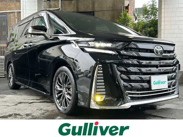 トヨタ ヴェルファイア ハイブリット Z プレミア 京都府 2023(令5)年 2.4万km ブラック 左右独立ムーンルーフ　/茶本革シート　/オットマン/シートヒーター/エアシート/メモリーパワーシート/モデリスタイルミネーションパネル　/純正メモリーナビ/フルセグTV/１３．２型有機ＥＬディスプレイフリップダウンモニター(V13T-R72F)/Bluetooth/USB入力端子/全方位カメラ　/ＨＵＤ　/ＢＳＭ /PKSB /RSA /RCTA /3眼LEDライト/ウィンカーミラー/デジタルインナーミラー/フロントフォグランプ/両側パワースライドドア/前方ドライブレコーダー(DRY-ST1700)/パドルシフト/ステアリングスイッチ/ステアリングヒーター/電動パーキングブレーキ/オートホールド/純正ドアバイザー