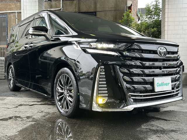トヨタ ヴェルファイア ハイブリット Z プレミア 京都府 2023(令5)年 2.4万km ブラック 左右独立ムーンルーフ　/茶本革シート　/オットマン/シートヒーター/エアシート/メモリーパワーシート/モデリスタイルミネーションパネル　/純正メモリーナビ/フルセグTV/１３．２型有機ＥＬディスプレイフリップダウンモニター(V13T-R72F)/Bluetooth/USB入力端子/全方位カメラ　/ＨＵＤ　/ＢＳＭ /PKSB /RSA /RCTA /3眼LEDライト/ウィンカーミラー/デジタルインナーミラー/フロントフォグランプ/両側パワースライドドア/前方ドライブレコーダー(DRY-ST1700)/パドルシフト/ステアリングスイッチ/ステアリングヒーター/電動パーキングブレーキ/オートホールド/純正ドアバイザー
