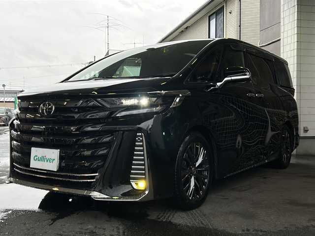 トヨタ ヴェルファイア ハイブリット Z プレミア 京都府 2023(令5)年 2.4万km ブラック 左右独立ムーンルーフ　/茶本革シート　/オットマン/シートヒーター/エアシート/メモリーパワーシート/モデリスタイルミネーションパネル　/純正メモリーナビ/フルセグTV/１３．２型有機ＥＬディスプレイフリップダウンモニター(V13T-R72F)/Bluetooth/USB入力端子/全方位カメラ　/ＨＵＤ　/ＢＳＭ /PKSB /RSA /RCTA /3眼LEDライト/ウィンカーミラー/デジタルインナーミラー/フロントフォグランプ/両側パワースライドドア/前方ドライブレコーダー(DRY-ST1700)/パドルシフト/ステアリングスイッチ/ステアリングヒーター/電動パーキングブレーキ/オートホールド/純正ドアバイザー