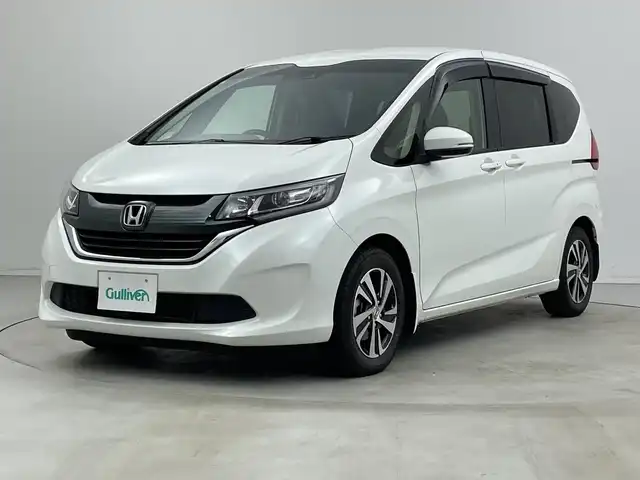 ホンダ フリード G ホンダセンシング 新潟県 2017(平29)年 2.3万km ホワイトオーキッドパール 純正ナビ/ワンセグTV/Bluetooth/CD/DVD//バックカメラ/両側パワースライドドア/3列シート/ETC/純正フロアマット/純正アルミホイール/LEDヘッドライト/プッシュスタート/スマートキー/スペアキー