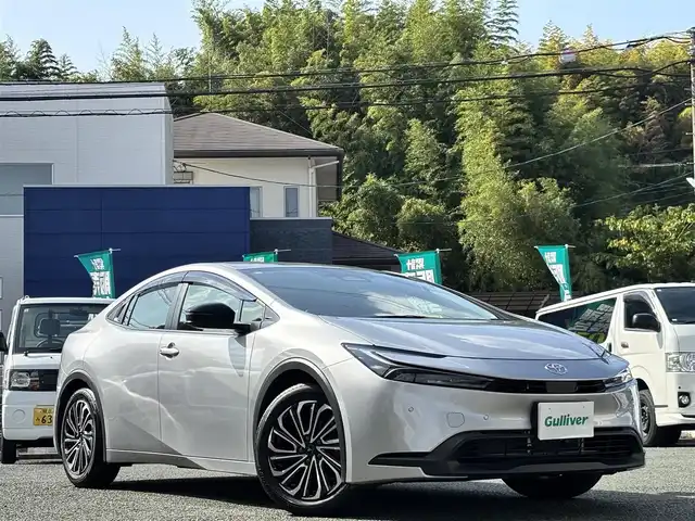 トヨタ プリウス X 熊本県 2024(令6)年 1.2万km シルバーメタリック ワンオーナー/モデリスタ17インチAW/社外ナビ(CN-HE02WD)/【フルセグTV/Bluetooth/CD/DVD】/バックカメラ/デジタルインナーミラー/ドライブレコーダー/コーナーセンサー/レーダークルーズコントロール/レーンキープアシスト/ブレーキホールド/LEDオートライト/ウィンカーミラー/プッシュスタート/ステアリングスイッチ/純正フロアマット/純正ドアバイザー/横滑り防止/盗難防止装置/保証書/取扱説明書