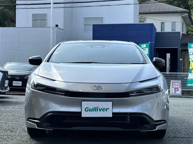 トヨタ プリウス X 熊本県 2024(令6)年 1.2万km シルバーメタリック ワンオーナー/モデリスタ17インチAW/社外ナビ(CN-HE02WD)/【フルセグTV/Bluetooth/CD/DVD】/バックカメラ/デジタルインナーミラー/ドライブレコーダー/コーナーセンサー/レーダークルーズコントロール/レーンキープアシスト/ブレーキホールド/LEDオートライト/ウィンカーミラー/プッシュスタート/ステアリングスイッチ/純正フロアマット/純正ドアバイザー/横滑り防止/盗難防止装置/保証書/取扱説明書