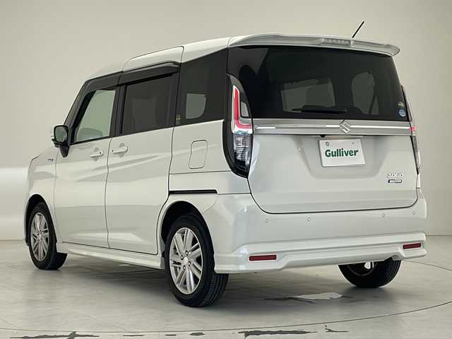 スズキ ソリオ HV MZ 沖縄県 2021(令3)年 1.7万km ピュアホワイトP 純正9インチナビ　/フルセグＴＶ　/DVD/Ｂｌｕｅｔｏｏｔｈ　/ＵＳＢ入力端子　/ＥＴＣ　/全方位モニター　/両側パワースライドドア　/クルーズコントロール　/シートヒーター　/オートライト　/ＬＥＤヘッドライト/電格ミラー　/コーナーセンサー　/スマートキー/プッシュスタート/純正フロアマット/純正15インチアルミホイール