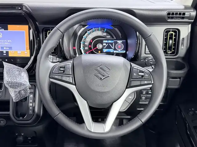 スズキ ハスラー HYBRID X 大阪府 2025(令7)年 0.1千km オフブルーメタリック/ソフトベージュメタリック 登録済未使用車　純正大型ナビ　全方位カメラ　バックカメラ　フルセグテレビ　CD/DVD再生　Bluetooth接続　シートヒーター　レーダークルーズコントロール　衝突被害軽減システム　クリアランスソナー　レーンキープアシスト　ＬＥＤヘッドライト　スマートキー　純正アルミホイール　プッシュスタート　スズキセーフティサポート