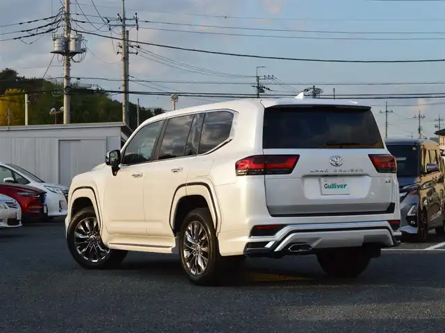 トヨタ ランドクルーザー ZX 栃木県 2024(令6)年 1.4万km プレシャスホワイトパール ワンオーナー/ディーラー点検記録簿/[R7]/Toyota Safety Sense/[プリクラッシュセーフティ/レーントレーシングアシスト/レーンディパーチャーアラート/オートマチックハイビーム/アダプティブハイビームシステム/ロードサインアシスト/先行車発進告知機能/プロアクティブドライビングシステム/ドライバー異常時対応システム]/レーダークルーズコントロール/ブラインドスポットモニター/ヘッドアップディスプレイ/パノラミックビューモニター/JBLプレミアムサウンドシステム/クリアランスソナー/ムーンルーフ/フルタイム4WD/マルチテレインセレクト/クロールコントロール/ダウンヒルアシストコントロール/リアクロストラフィックアラート/リアカメラディテクション/リアエンターテイメント/モデリスタエアロ/12.3インチマルチメディアディスプレイ[T-connect]/[フルセグ/AM/FM/CD/DVD/BT/Miracast]/オートライト/LEDヘッドライト/パワーシート[前席]/シートヒーター[前席]/パワーバックドア/クールBOX/指紋認証システム/エンジンイモビライザー/スペアキー×1/取扱説明書/保証書