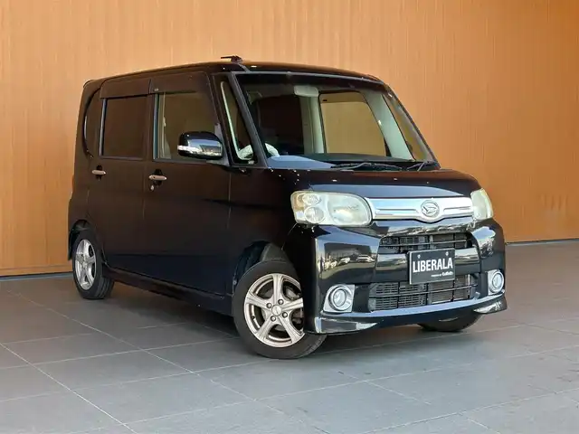 ダイハツ タント Gスペシャル 愛知県 2013(平25)年 15.4万km ブラックマイカメタリック 登録時走行距離153653キロ/純正７インチナビ/(BT接続/AMFMラジオ/CD/DVD)/片側パワースライドドア/ワンオーナー/アイドリングストップ/バックカメラ/スペアキー/純正フロアマット/純正ドアバイザー/14インチアルミホイール/フロントフォグランプ/ウインカーミラー/取扱説明書/保証書