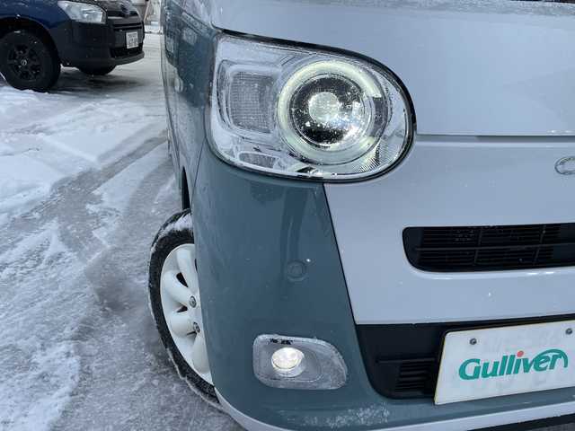 ダイハツ ムーヴ キャンバス ストライプス G 道北・旭川 2023(令5)年 1.9万km シャイニングホワイトパール/レイクブルーメタリック /４WD//禁煙車//社外ナビ/CD/DVD/SD/BT/USB/TV//バックカメラ//両側パワースライドドア//前席シートヒーター//前方ドライブレコーダー//ETC//アイドリングストップ//ホっとカップホルダー//オートエアコン//スマートアシスト/衝突回避支援/誤発進抑制機能/車線逸脱警報機能/ふらつき警報機能/先行車発進お知らせ機能/標識認識機能/アダプティブクルーズコントロール//ステアリングスイッチ//オートライト//LEDヘッドライト//LEDフォグランプ//電動格納ミラー//スマートキー//スペアキー//プッシュスタート