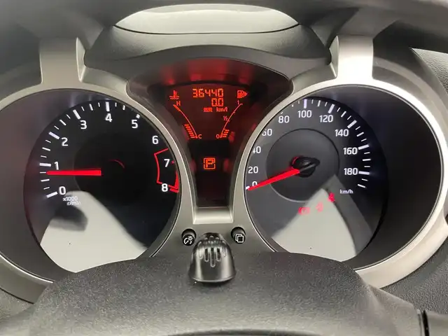 日産 ジューク 15RX タイプV 富山県 2012(平24)年 3.7万km ダークメタルグレー 純正ナビ（AM/FM/DVD/BT/フルセグ）/バックカメラ/ドライブレコーダー/純正フロアマット/オートハロゲンライト/フォグライト/ドアバイザー/革巻きステアリング/電動格納ミラー/プッシュスタート/スマートキー/スペアキー
