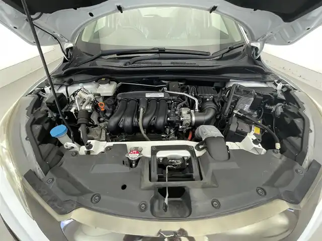 ホンダ ヴェゼル ハイブリッド Z ホンダセンシング 滋賀県 2016(平28)年 7.1万km ホワイトオーキッドパール 禁煙車/純正ナビ/【CD/DVD/Bluetooth/フルセグ/USB/HDMI】/バックカメラ/ビルトインETC/ハーフレザーシート/前席シートヒーター/レーダークルーズコントロール/レーンキープアシスト/ブレーキホールド/プッシュスタート/スマートキー/ステアリングスイッチ