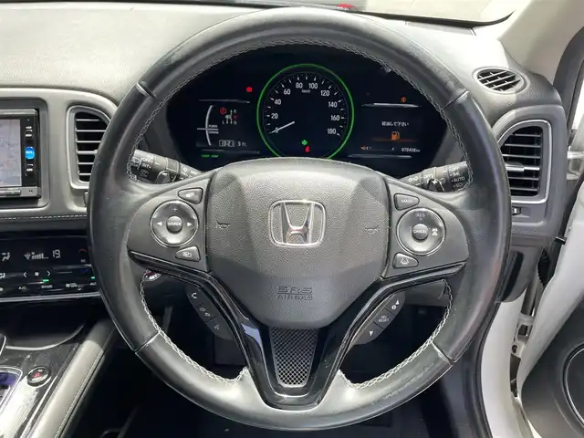 ホンダ ヴェゼル ハイブリッド Z ホンダセンシング 滋賀県 2016(平28)年 7.1万km ホワイトオーキッドパール 禁煙車/純正ナビ/【CD/DVD/Bluetooth/フルセグ/USB/HDMI】/バックカメラ/ビルトインETC/ハーフレザーシート/前席シートヒーター/レーダークルーズコントロール/レーンキープアシスト/ブレーキホールド/プッシュスタート/スマートキー/ステアリングスイッチ