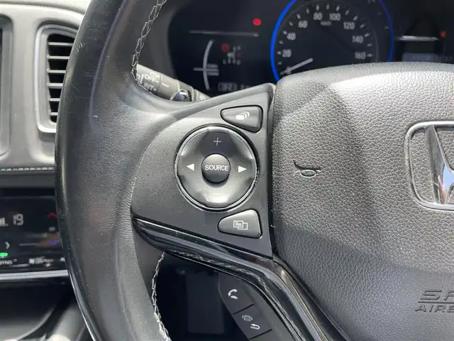 ホンダ ヴェゼル ハイブリッド Z ホンダセンシング 滋賀県 2016(平28)年 7.1万km ホワイトオーキッドパール 禁煙車/純正ナビ/【CD/DVD/Bluetooth/フルセグ/USB/HDMI】/バックカメラ/ビルトインETC/ハーフレザーシート/前席シートヒーター/レーダークルーズコントロール/レーンキープアシスト/ブレーキホールド/プッシュスタート/スマートキー/ステアリングスイッチ