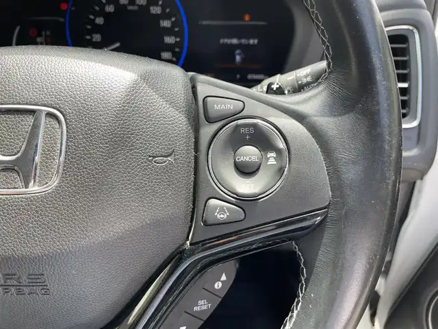 ホンダ ヴェゼル ハイブリッド Z ホンダセンシング 滋賀県 2016(平28)年 7.1万km ホワイトオーキッドパール 禁煙車/純正ナビ/【CD/DVD/Bluetooth/フルセグ/USB/HDMI】/バックカメラ/ビルトインETC/ハーフレザーシート/前席シートヒーター/レーダークルーズコントロール/レーンキープアシスト/ブレーキホールド/プッシュスタート/スマートキー/ステアリングスイッチ