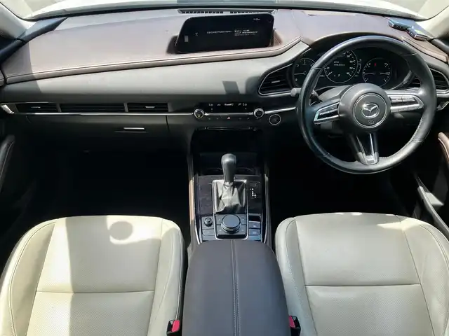 マツダ ＣＸ－３０ XD Lパッケージ 静岡県 2020(令2)年 2.6万km スノーフレイクホワイトパールマイカ エンジンスタートボタン/パワーステアリング/パワーウィンドウ/取扱説明書/パドルシフト/オートエアコン/スマートキー/スペアキー１本/クルーズコントロール/アイドリングストップ/USB入力端子/ETC/全方位カメラ/純正ナビ（CD/DVD/BT/フルセグ）/電動リアゲート/純正フロアマット/D席パワーシート/D席N席シートヒーター/純正アルミホイール/ABS/横滑り防止装置/コーナーセンサー前後/レーンキープアシスト/オートライト/オートマチックハイビーム/LEDヘッドライト/W＋サイドエアバック/衝突軽減システム/BOSEスピーカー/ステアリングヒーター
