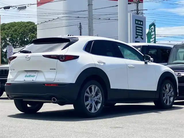マツダ ＣＸ－３０ XD Lパッケージ 静岡県 2020(令2)年 2.6万km スノーフレイクホワイトパールマイカ エンジンスタートボタン/パワーステアリング/パワーウィンドウ/取扱説明書/パドルシフト/オートエアコン/スマートキー/スペアキー１本/クルーズコントロール/アイドリングストップ/USB入力端子/ETC/全方位カメラ/純正ナビ（CD/DVD/BT/フルセグ）/電動リアゲート/純正フロアマット/D席パワーシート/D席N席シートヒーター/純正アルミホイール/ABS/横滑り防止装置/コーナーセンサー前後/レーンキープアシスト/オートライト/オートマチックハイビーム/LEDヘッドライト/W＋サイドエアバック/衝突軽減システム/BOSEスピーカー/ステアリングヒーター