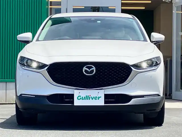 マツダ ＣＸ－３０ XD Lパッケージ 静岡県 2020(令2)年 2.6万km スノーフレイクホワイトパールマイカ エンジンスタートボタン/パワーステアリング/パワーウィンドウ/取扱説明書/パドルシフト/オートエアコン/スマートキー/スペアキー１本/クルーズコントロール/アイドリングストップ/USB入力端子/ETC/全方位カメラ/純正ナビ（CD/DVD/BT/フルセグ）/電動リアゲート/純正フロアマット/D席パワーシート/D席N席シートヒーター/純正アルミホイール/ABS/横滑り防止装置/コーナーセンサー前後/レーンキープアシスト/オートライト/オートマチックハイビーム/LEDヘッドライト/W＋サイドエアバック/衝突軽減システム/BOSEスピーカー/ステアリングヒーター