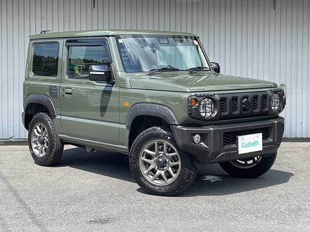 スズキ ジムニー XC 長野県 2025(令7)年 0.3万km ジャングルグリーン スズキセーフティサポート /ワンオーナー /オーバーフェンダー/純正１６イン阿智アルミ/TOYOオープンカントリータイヤ/ノーマルタイヤ積込/IPFサイドストレージパネル/リアドアストップダンパー/バイザー