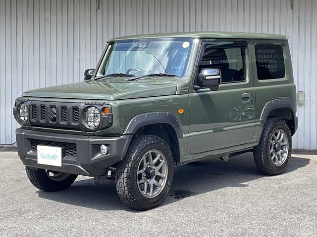 スズキ ジムニー XC 長野県 2025(令7)年 0.3万km ジャングルグリーン スズキセーフティサポート /ワンオーナー /オーバーフェンダー/純正１６イン阿智アルミ/TOYOオープンカントリータイヤ/ノーマルタイヤ積込/IPFサイドストレージパネル/リアドアストップダンパー/バイザー