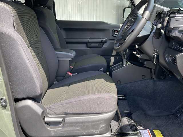 スズキ ジムニー XC 長野県 2025(令7)年 0.3万km ジャングルグリーン スズキセーフティサポート /ワンオーナー /オーバーフェンダー/純正１６イン阿智アルミ/TOYOオープンカントリータイヤ/ノーマルタイヤ積込/IPFサイドストレージパネル/リアドアストップダンパー/バイザー