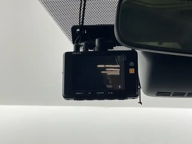 トヨタ ヴォクシー ハイブリッド ZS 煌Ⅱ 愛知県 2019(平31)年 6万km イナズマスパーキングブラックガラスフレーク 禁煙車/純正10インチナビ/（CD/DVD/Bluetooth/フルセグTV/HDMI/USB)/バックカメラ/フリップダウンモニター/トヨタセーフティセンス/・プリクラッシュセーフティ/・レーンディパーチャーアラート/・オートマチックハイビーム/クルーズコントロール/前後ドライブレコーダー/ETC/シートヒーター/両側パワースライドドア/スマートキー/エンジンスターター/プッシュスタート/純正16インチアルミホイール/LEDヘッドライト/フロントフォグランプ/純正フロアマット/横滑り防止装置