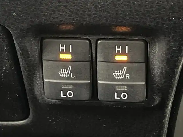 トヨタ ヴォクシー ハイブリッド ZS 煌Ⅱ 愛知県 2019(平31)年 6万km イナズマスパーキングブラックガラスフレーク 禁煙車/純正10インチナビ/（CD/DVD/Bluetooth/フルセグTV/HDMI/USB)/バックカメラ/フリップダウンモニター/トヨタセーフティセンス/・プリクラッシュセーフティ/・レーンディパーチャーアラート/・オートマチックハイビーム/クルーズコントロール/前後ドライブレコーダー/ETC/シートヒーター/両側パワースライドドア/スマートキー/エンジンスターター/プッシュスタート/純正16インチアルミホイール/LEDヘッドライト/フロントフォグランプ/純正フロアマット/横滑り防止装置