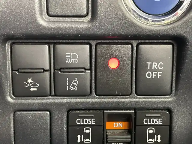 トヨタ ヴォクシー ハイブリッド ZS 煌Ⅱ 愛知県 2019(平31)年 6万km イナズマスパーキングブラックガラスフレーク 禁煙車/純正10インチナビ/（CD/DVD/Bluetooth/フルセグTV/HDMI/USB)/バックカメラ/フリップダウンモニター/トヨタセーフティセンス/・プリクラッシュセーフティ/・レーンディパーチャーアラート/・オートマチックハイビーム/クルーズコントロール/前後ドライブレコーダー/ETC/シートヒーター/両側パワースライドドア/スマートキー/エンジンスターター/プッシュスタート/純正16インチアルミホイール/LEDヘッドライト/フロントフォグランプ/純正フロアマット/横滑り防止装置