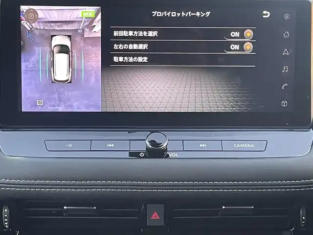 日産 エクストレイル G e－4ORCE 福岡県 2025(令7)年 0.1万km ブリリアントホワイトパール ワンオーナー/4WD/プロパイロット/プロパイロットパーキング/純正12.3インチナビ/　(AM/FM/Bluetooth/Andoroid Auto/フルセグTV)/アラウンドビューモニター/バック/フロント/サイドカメラ/運転支援機能/・エマージェンシーブレーキ/・踏み間違い衝突防止/・前方衝突予測/・後側方車両検知/衝突防止支援/・車線逸脱警報/防止支援/・後退時車両検知/・ふらつき警報/・標識検知/・クルーズコントロール/・オートライト/・オートマチックハイビーム/・横滑り防止機能/・クリアランスソナー/・コーナーセンサー/純正19インチアルミホイール/パワーバックドア/インテリジェントルームミラー/黒色レザーシート/純正前方ドライブレコーダー【DJ6】/ビルトインETC2.0/ヘッドアップディスプレイ/ステアリングスイッチ/ステアリングヒーター/シートメモリー(D)/パワーシート(D/N)/シートヒーター(全席)/純正フロアマット＆ラバーマット/ラゲッジカバー/ワイヤレス充電器/USBソケット×2、タイプC×2/アクセサリーソケット/100V電源/ISOFIX/スペアキー×1/保証書、取説、ナビ取説
