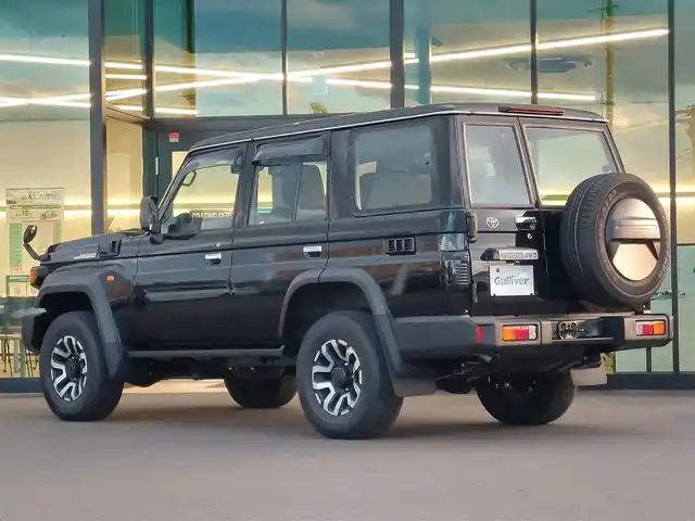 トヨタ ランドクルーザー AX 東京都 2024(令6)年 0.7万km アティチュードブラックマイカ 社外メモリナビ/フルセグTV/バックカメラ/ドライブレコーダー/ハーフレザーシート/電動デフロック/LEDヘッドライト/Toyota Safety Sense/・プリクラッシュセーフティ/・レーンディパーチャーアラート/・オートマチックハイビーム/クルーズコントロール