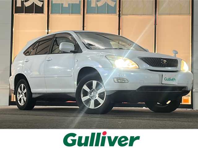 トヨタ ハリアー 240G Lパック プライムセレ 山形県 2006(平18)年 7.5万km クールホワイトパールクリスタルシャイン 禁煙車/4WD/純正ナビ/バックカメラ/オートライト/フォグランプ/D席パワーシート/ステアリングスイッチ/ETC/レーダー探知機/純正AW/純正フロアマット/純正AW4本積載/電動格納ミラー/ドアバイザー