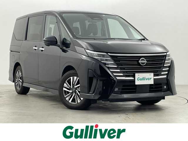 日産 セレナ e－パワー ルキシオン 群馬県 2023(令5)年 1.1万km ダイヤモンドブラック 100VAC電源(1500W)/純正12.3インチナビ/AM/FM/CD/DVD/BT/USB/HDMI/AppleCarPlay/AndroidAuto/フルセグTV/ビルトインETC2.0/ワイヤレス充電/アラウンドビューモニター/インテリジェントルームミラー/プロパイロット（ナビリンク機能付）/プロパイロットパーキング/アダプティブLEDヘッドライト/============/ハンズフリー両側パワースライドドア/エマージェンシーブレーキ/前方衝突予測警報(FCW)/車線逸脱防止支援システム(LI)＋車線逸脱警報(LDW)/後側方衝突防止支援システム(BSI)＋後側方車両検知警報(BSW)/後退時車両検知警報(RCTA)/ふらつき警報/踏み間違い衝突防止アシスト/標識検知機能/スマートキー/プッシュスタート