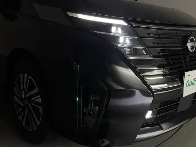 日産 セレナ e－パワー ルキシオン 群馬県 2023(令5)年 1.1万km ダイヤモンドブラック 100VAC電源(1500W)/純正12.3インチナビ/AM/FM/CD/DVD/BT/USB/HDMI/AppleCarPlay/AndroidAuto/フルセグTV/ビルトインETC2.0/ワイヤレス充電/アラウンドビューモニター/インテリジェントルームミラー/プロパイロット（ナビリンク機能付）/プロパイロットパーキング/アダプティブLEDヘッドライト/============/ハンズフリー両側パワースライドドア/エマージェンシーブレーキ/前方衝突予測警報(FCW)/車線逸脱防止支援システム(LI)＋車線逸脱警報(LDW)/後側方衝突防止支援システム(BSI)＋後側方車両検知警報(BSW)/後退時車両検知警報(RCTA)/ふらつき警報/踏み間違い衝突防止アシスト/標識検知機能/スマートキー/プッシュスタート