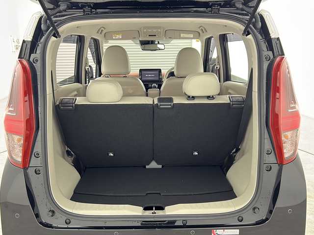 日産 デイズ ボレロ 三重県 2020(令2)年 1.8万km アメジストブラック/シルキーホワイト 禁煙車　/純正９インチＳＤナビ　/エマージェンシーブレーキ　/セーフティシールド　/衝突被害軽減ブレーキ　/車線逸脱防止装置　/オートハイビーム　/アラウンドビューモニター　/インテリジェントスマートルームミラー/オートAC/革巻きステアリング/スマートキー/プッシュスタート/アイドリングストップ/純正前方ドライブレコーダー/ベンチシート/前後コーナーセンサー/ハーフレザーシート /ドアバイザー