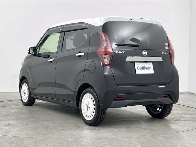 日産 デイズ ボレロ 三重県 2020(令2)年 1.8万km アメジストブラック/シルキーホワイト 禁煙車　/純正９インチＳＤナビ　/エマージェンシーブレーキ　/セーフティシールド　/衝突被害軽減ブレーキ　/車線逸脱防止装置　/オートハイビーム　/アラウンドビューモニター　/インテリジェントスマートルームミラー/オートAC/革巻きステアリング/スマートキー/プッシュスタート/アイドリングストップ/純正前方ドライブレコーダー/ベンチシート/前後コーナーセンサー/ハーフレザーシート /ドアバイザー