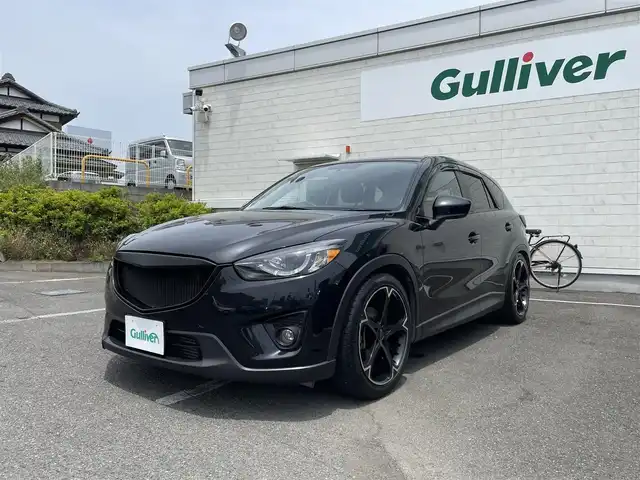 マツダ ＣＸ－５ XD 神奈川県 2012(平24)年 5.7万km ブラック 社外パーツ多数/・社外20インチAW/・D-MAX車高調/・社外HIDヘッドライト/・社外KEDテールレンズ/・社外グリル/純正パーツ車載/・純正17インチ夏タイヤ付き4本車載/・純正ヘッドライト/・純正テールレンズ/・純正グリル/社外ディスプレイオーディオ/・Bluetoothオーディオ/・スマホ連携/・バックカメラ/レザー調シートカバー/新車時手帳、取説