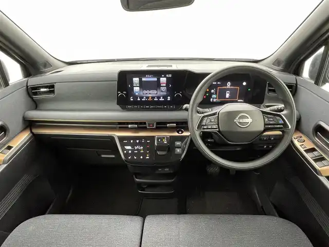 日産 サクラ G 熊本県 2022(令4)年 1.1万km ブラック 純正ナビ　/全周囲カメラ　/前後クリアランスソナー　/プロパイロット　/衝突軽減ブレーキ　/先行車発進お知らせ　/標識認識機能　/ふらつき警報機能　/前席シートヒーター　/ステアリングヒーター/純正フロアマット/純正１４インチAW/オートライト　/オートマチックハイビーム/LEDヘッドライト/フォグライト/スマートキー/プッシュスタート/スペアキー1本/保証書