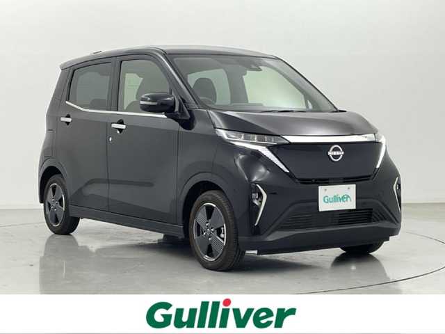 日産 サクラ G 熊本県 2022(令4)年 1.1万km ブラック 純正ナビ　/全周囲カメラ　/前後クリアランスソナー　/プロパイロット　/衝突軽減ブレーキ　/先行車発進お知らせ　/標識認識機能　/ふらつき警報機能　/前席シートヒーター　/ステアリングヒーター/純正フロアマット/純正１４インチAW/オートライト　/オートマチックハイビーム/LEDヘッドライト/フォグライト/スマートキー/プッシュスタート/スペアキー1本/保証書