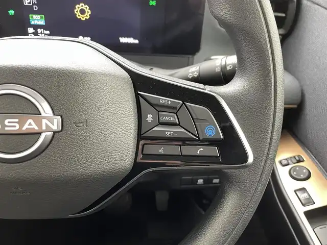 日産 サクラ G 熊本県 2022(令4)年 1.1万km ブラック 純正ナビ　/全周囲カメラ　/前後クリアランスソナー　/プロパイロット　/衝突軽減ブレーキ　/先行車発進お知らせ　/標識認識機能　/ふらつき警報機能　/前席シートヒーター　/ステアリングヒーター/純正フロアマット/純正１４インチAW/オートライト　/オートマチックハイビーム/LEDヘッドライト/フォグライト/スマートキー/プッシュスタート/スペアキー1本/保証書